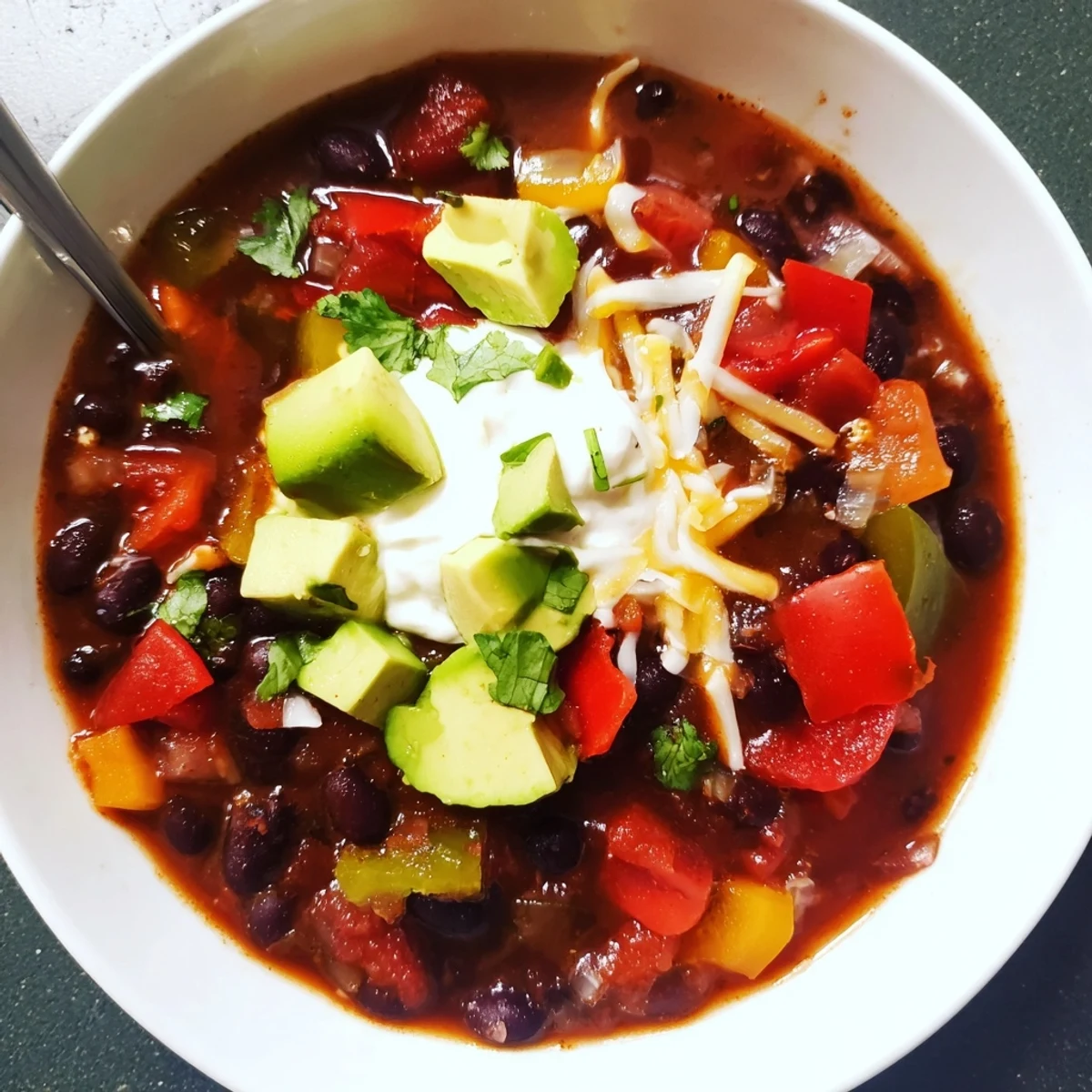 Hearty Spicy Black Bean Chili, perfect for cozy meals on chilly evenings.
