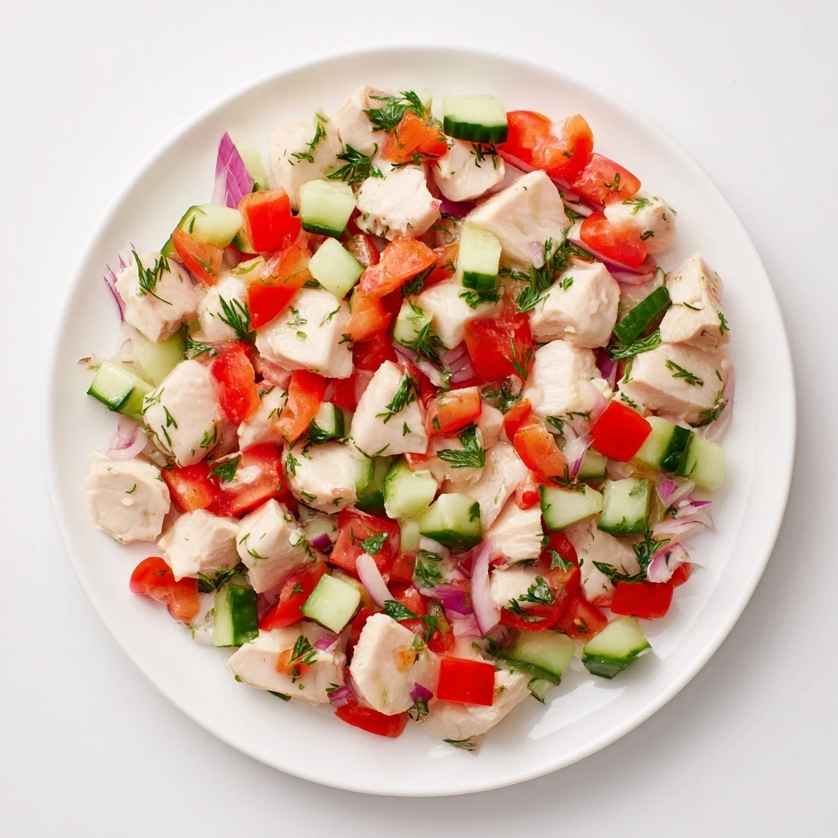 Vibrant Cucumber and Chicken Clean Shaker Salad: Tender chicken with crisp cucumber and fresh herbs.