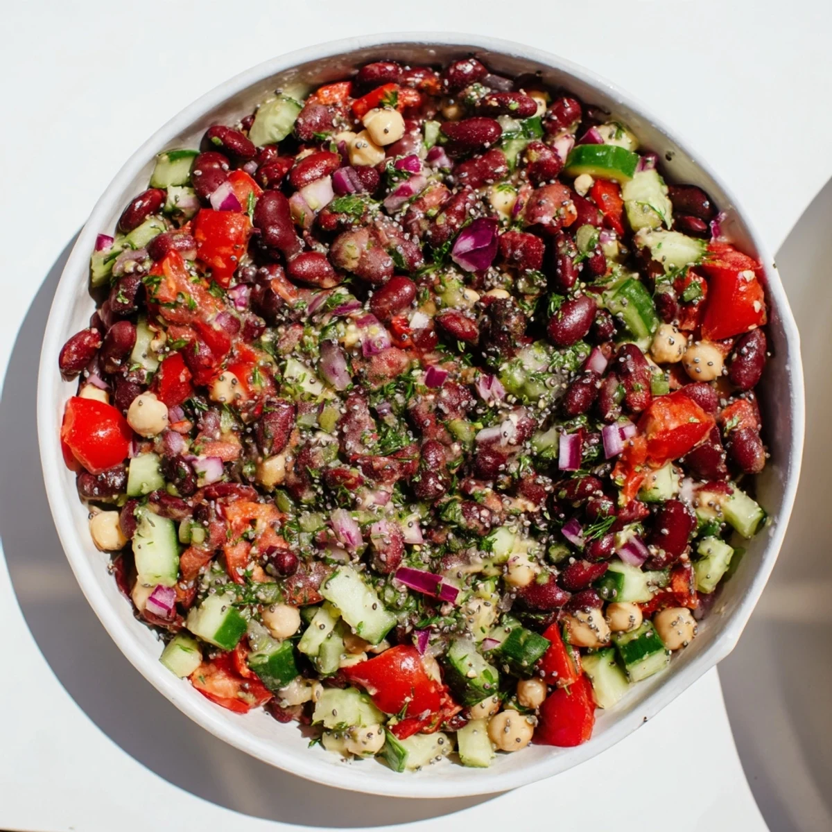 Vibrant Dense Bean Salad, a colorful mix of beans and crunchy vegetables, ready to serve.