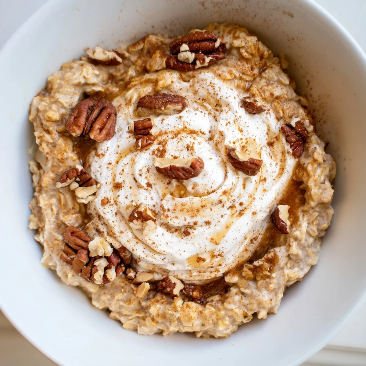 Warm and spiced Pumpkin Spice Latte Oats, perfect for a cozy fall breakfast, served in a bowl.