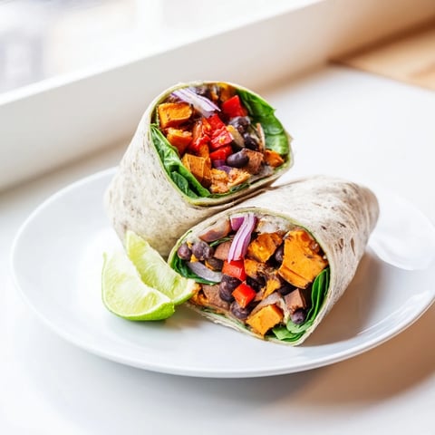Savory Roasted Sweet Potato & Black Bean Holiday Wrap, perfectly wrapped and ready for a meal.