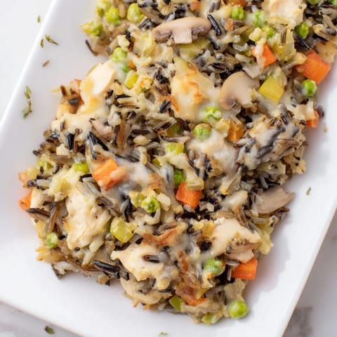 Creamy, comforting Chicken and Wild Rice Bake, topped with golden breadcrumbs, for a hearty meal.