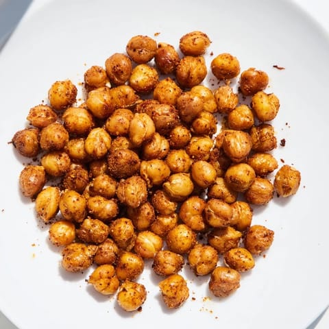 Close-up of freshly baked, flavorful Crispy Chickpea Snack, spiced and ready for a satisfying, healthy treat.