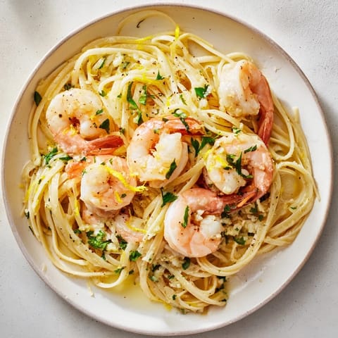 Tender shrimp and pasta coated in lemon herb sauce, a delicious take on Lemon Herb Pasta.