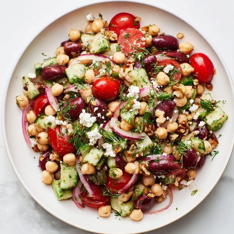 A close-up of the delicious Dense Bean Salad, featuring hearty beans and fresh herbs for a filling meal.