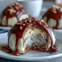 Carrot cake truffles with cream cheese coating, spiced and creamy, perfect for spring dessert platters.