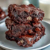 Cadbury Egg Chocolate Brownies with Crumbled Top - Rich, fudgy brownies loaded with mini eggs and topped with crunchy chocolate crumble.